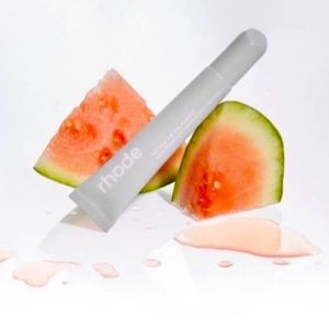 Rhode peptide lip treatment in watermelon slice.